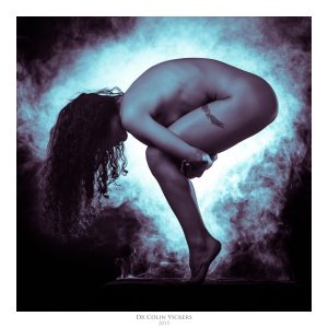 Fine Art Nude Photographer Vienna - Nude Model Poses On Box Surrounded By Smoke