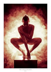 Fine Art Nude Photographer Vienna - Nude Model Makes Abstract Pose In Smoke