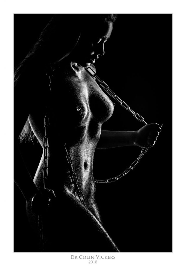 Amber Karis Bassick nude covered in oil playing with chains